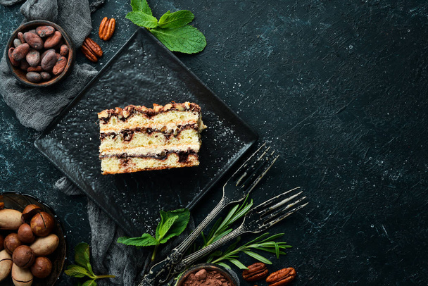 Delicious sweet cake with nuts and chocolate. Top view. - Fotoğraf, Görsel