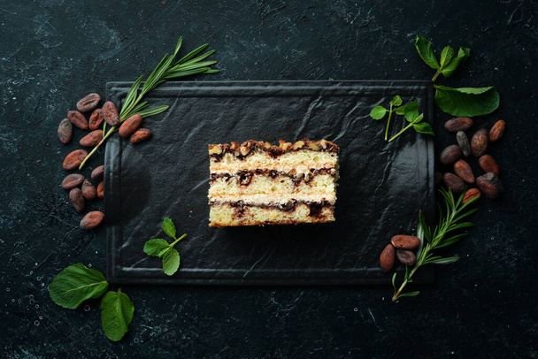 Delicious sweet cake with nuts and chocolate. Top view. - Foto, afbeelding