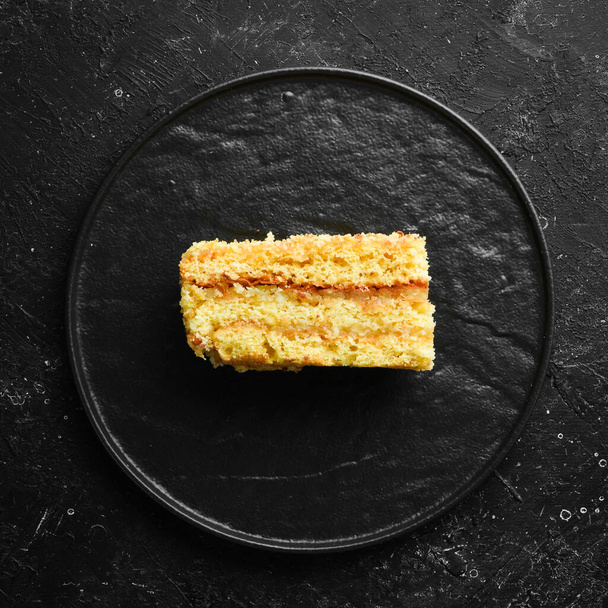 Delicious sweet cake with lemon and zest. Top view. Free space for your text. - 写真・画像