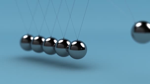 Animación de bucle sin costuras de la cuna de Newton con una profundidad de campo muy superficial
 - Metraje, vídeo
