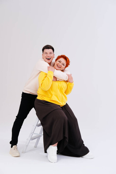 Studio portrait of funny couple posing  - Foto, afbeelding