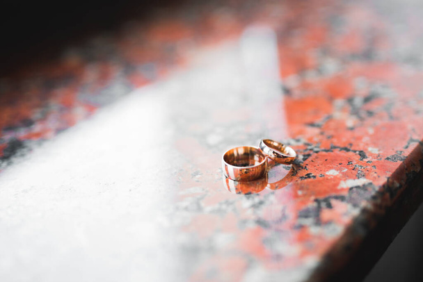 Beautiful toned picture with wedding rings - Foto, imagen
