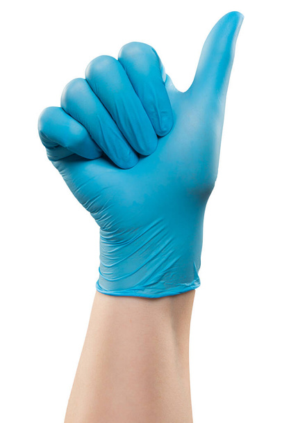 Hombre doctor mano en guante azul hacer gesto. Grabado en el estudio. Aislado con ruta de recorte sobre fondo blanco
 - Foto, Imagen
