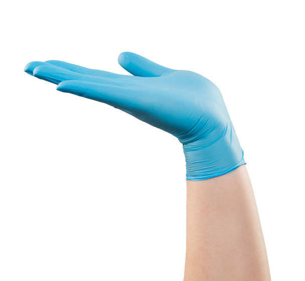 Homme médecin main dans le gant bleu faire un geste. Tourné en studio. Isolé avec chemin de coupe sur fond blanc
 - Photo, image