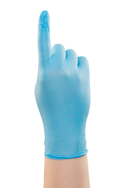 Hombre doctor mano en guante azul hacer gesto. Grabado en el estudio. Aislado con ruta de recorte sobre fondo blanco
 - Foto, imagen