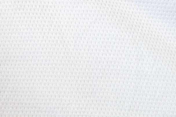 Tissu jersey maille blanche fond. tissu sport porter texture pour l'exercice. léger, bon débit d'air, frais et facile à sécher de la sueur. papier peint abstrait avec espace de copie pour le texte
. - Photo, image