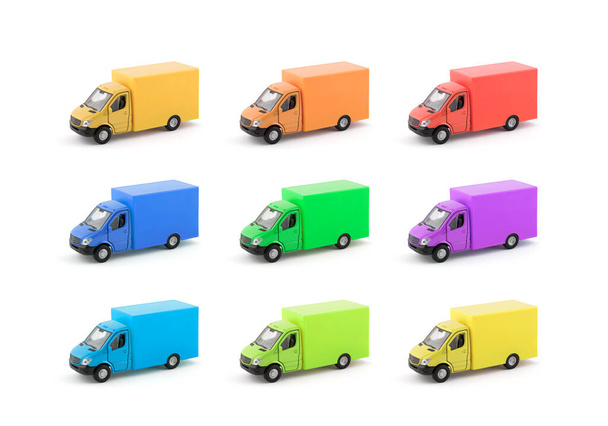 Group of colorful cargo delivery trucks on white background - Φωτογραφία, εικόνα