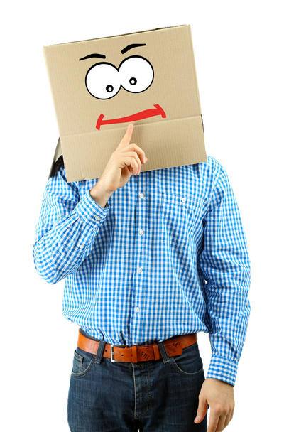 Man with cardboard box on his head isolated on white - Zdjęcie, obraz