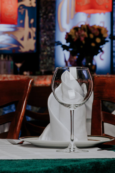empty wine glasses on the restaurants dining table - Photo, Image