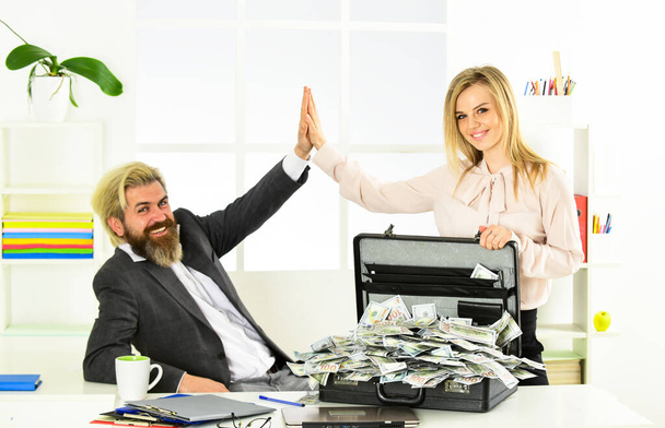 Financial success. Tax service. Financial expert. Taxation. Illegal profit. Man with briefcase full of cash. Financial achievement. Money laundering. Business challenges. Accounting and banking - Fotoğraf, Görsel