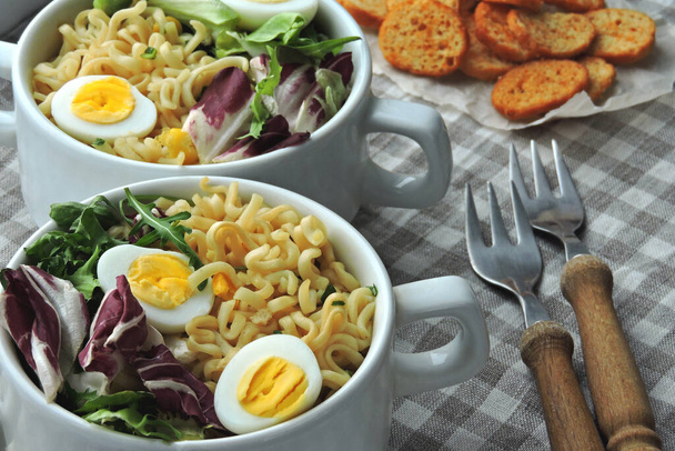 Noodles with salad and quail eggs. Healthy food. Diet food. - Photo, Image