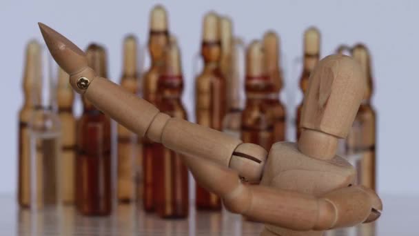 Figurka z drewna pokazująca wiele możliwości szczepienia - Materiał filmowy, wideo