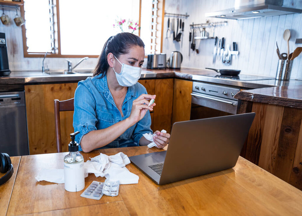 COVID-19 Online medical Consultation. Sick Woman with mask connecting with doctor on video call. Online Patient talking to physician for medical advice on treatment of coronavirus disease symptoms. - Foto, Imagem