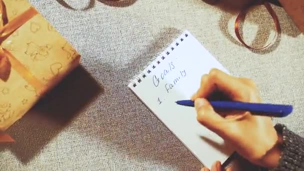 Goals concept. Hands writing goals for the new year. - Felvétel, videó