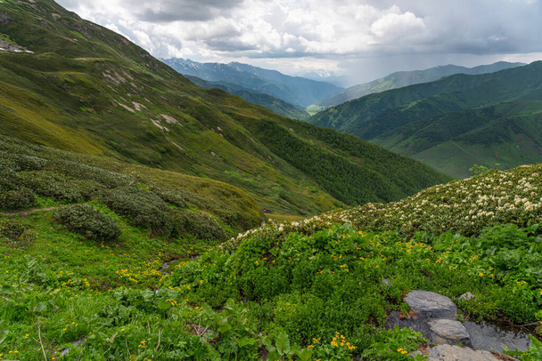 Ushguli village surrounded by Caucasus mountains in summer season, Svaneti region in Georgia, Europe - Photo, Image