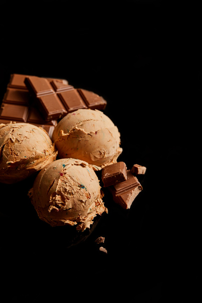 fresh delicious chocolate ice cream isolated on black - Photo, Image