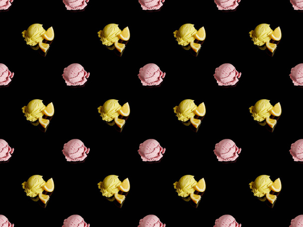 delicious lemon and strawberry ice cream balls isolated on black, seamless pattern - Photo, Image