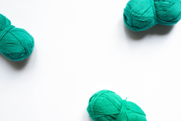 top view of green wool yarn on white background - Photo, Image