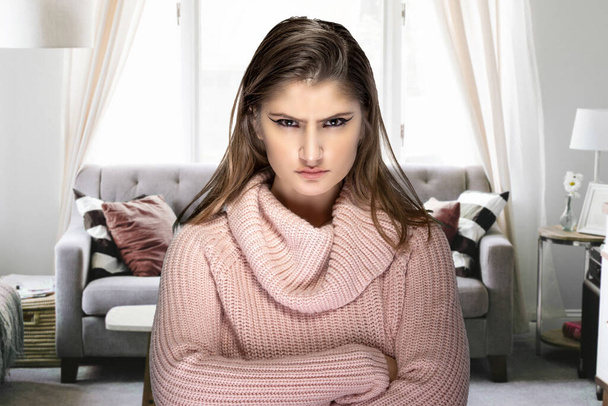 Woman getting impatient and angry for having to stay at home during pandemic lock down or quarantine.  She is upset and having a mental breakdown because of boredom or stress - Photo, Image