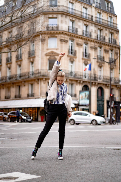 Young beautiful woman outdoors in Paris. Travel concept. Funny photos - Fotografie, Obrázek
