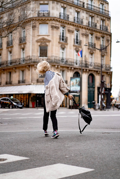 Young beautiful woman outdoors in Paris. Travel concept. Funny photos - Foto, afbeelding