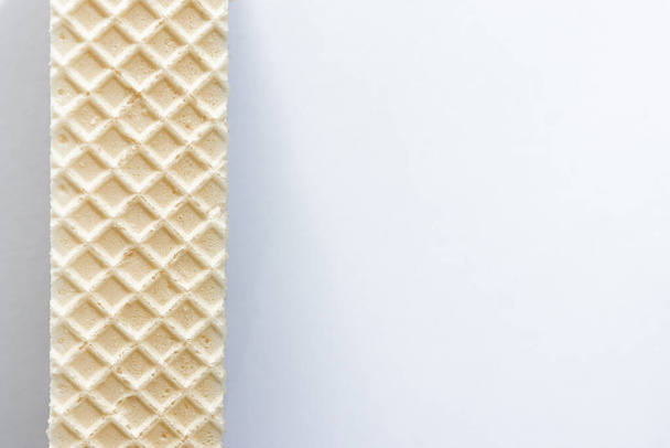 crispy waffle with cream and chocolate filling on a white background - Photo, image