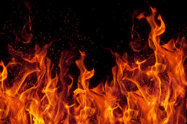 Fire isolated over black background - Photo, Image