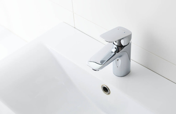 Warsaw, Poland - March 18, 2020:Hansgrohe mixer.Hansgrohe SE is a German sanitary fittings manufacturer.  Hansgrohe is one of the worlds largest shower head, hand shower and tap suppliers. - Foto, Bild