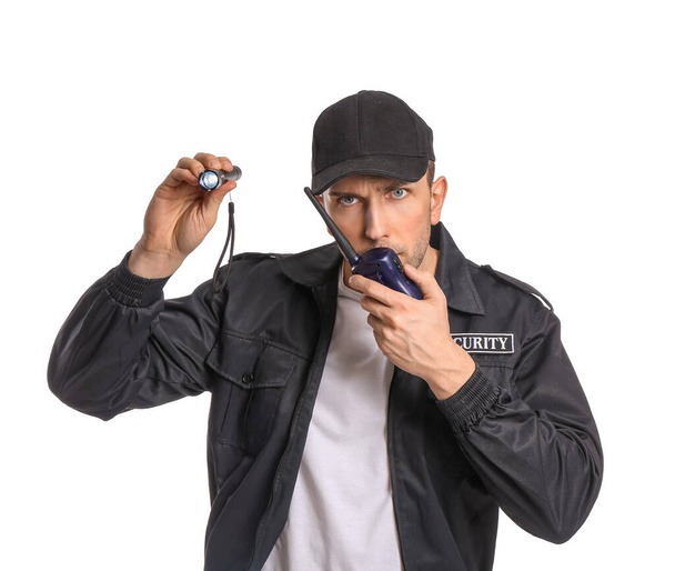 Gardien de sécurité masculin avec lampe de poche sur fond blanc
 - Photo, image