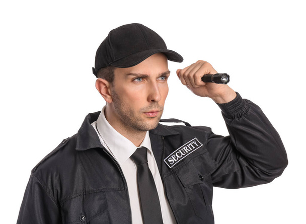 Protetor de segurança masculino com lanterna no fundo branco
 - Foto, Imagem