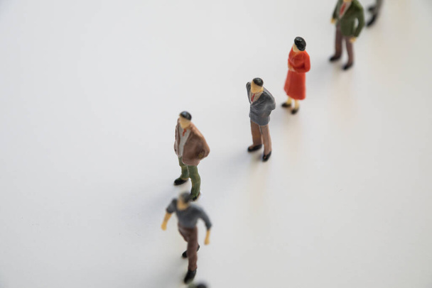 Toy, miniature figures of human in costumes. - Foto, afbeelding