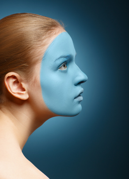 Young girl with facial mask. - Photo, Image