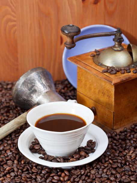 Чашка кофе и жареная фасоль
 - Фото, изображение