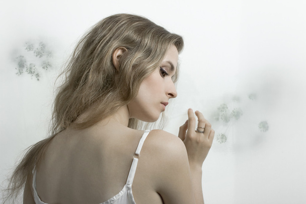 The beautiful girl on a white background - Zdjęcie, obraz