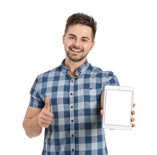 Young man with tablet computer on white background - Foto, Imagem