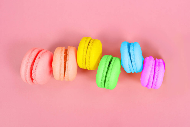 the multi-colored cookies on a pink background, lgbt theme - Fotó, kép
