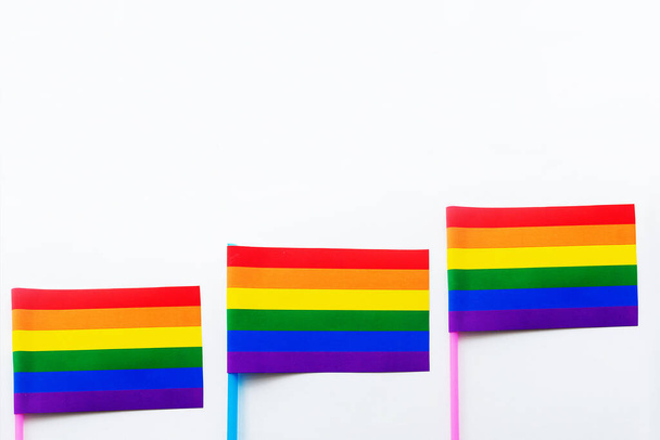 LGBT regenboog vlag op een witte achtergrond, banner - Foto, afbeelding