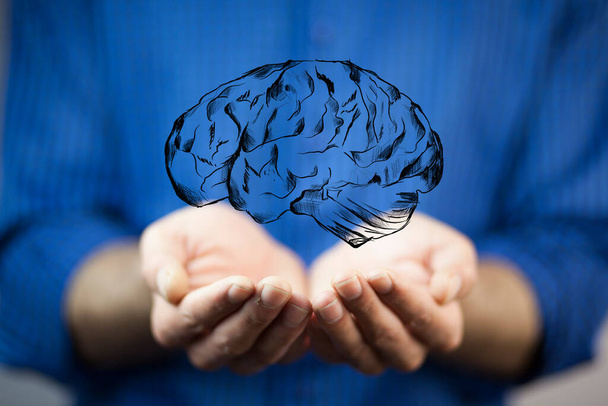бізнесмен тримає цифрове зображення мозку в долоні
 - Фото, зображення