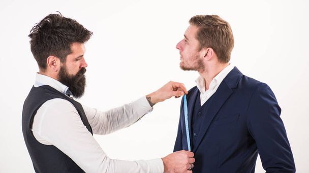 Sewing exclusive clothes concept. Man with beard and mustache - Photo, image