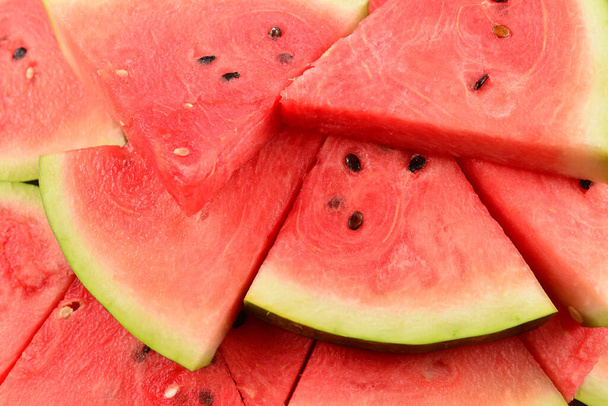 Šťavnatý meloun plátky pozadí. Horní pohled.  - Fotografie, Obrázek