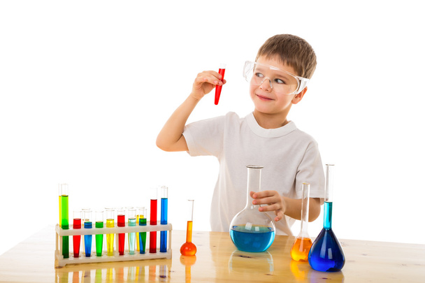 Boy making chemical experiment - Фото, изображение