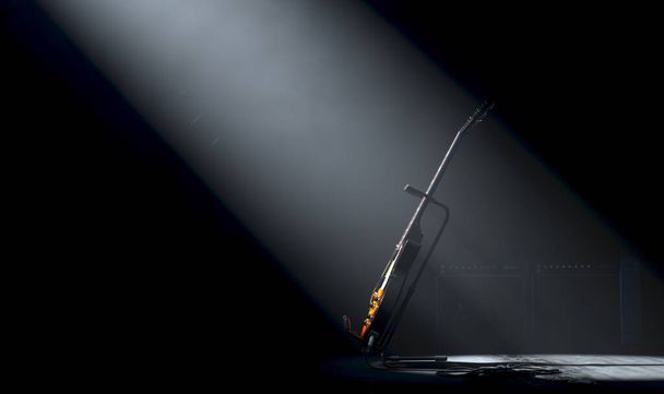 Электрогитара, лежащая на трибуне на сцене музыкального концерта, освещенная одним драматическим прожектором на темном фоне - 3D рендеринг - Фото, изображение