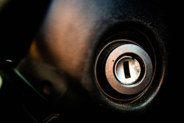 Close-up of car keyhole. Interior parts of cars - Фото, изображение
