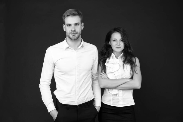 White style. Business couple. Business team. Partnership concept. Office fashion and corporate attire. Businessman ceo. Businesswoman and employee. Business startup concept. Beautiful people - Foto, afbeelding