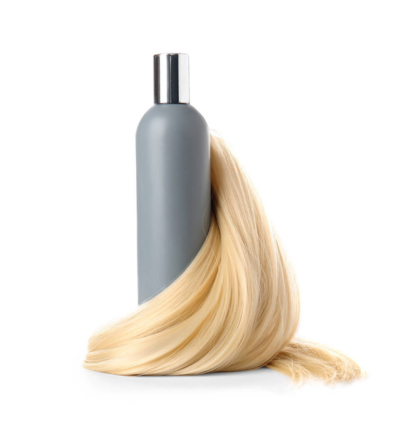 Botella de champú para cabello rubio sobre fondo blanco
 - Foto, Imagen