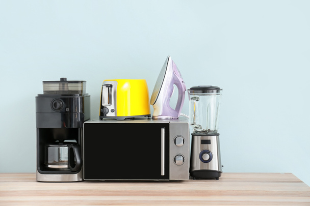 Different household appliances on table - Photo, Image