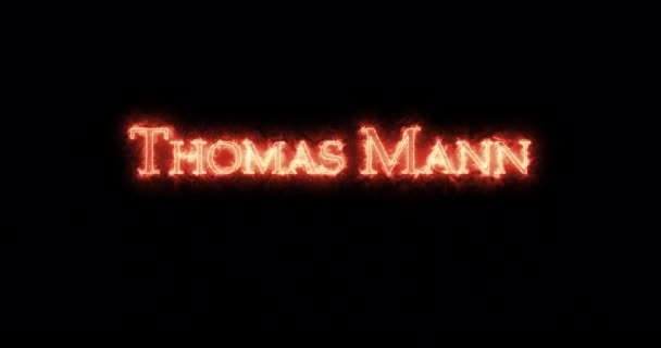 Thomas Mann written with fire. Loop - Footage, Video