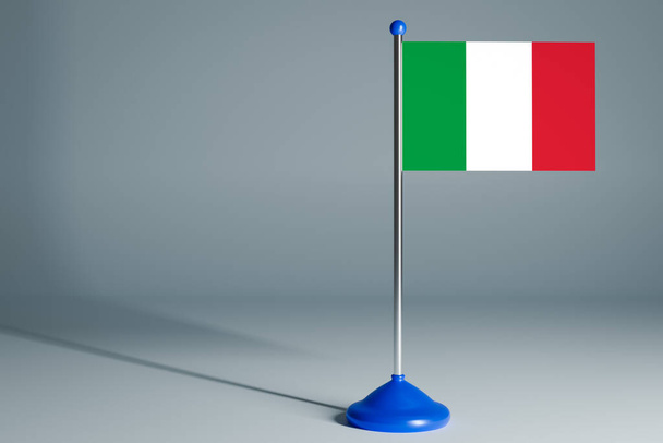 Il 3d che rende realistica la bandiera nazionale d'Italia su palo d'acciaio su sfondo grigio isolato. Bandiera da tavolo bianca, adatta per design, mocku
 - Foto, immagini