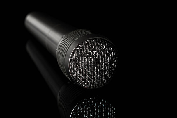 Audio microphone close-up on a black background - Photo, Image
