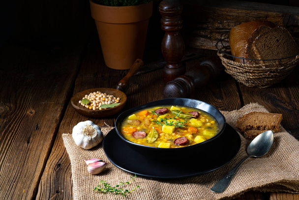 Rustic pea soup with bacon and sausages - Φωτογραφία, εικόνα